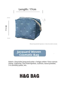 Denim toiletry bag detail with white bow, heart pattern, and 17x11x14cm size measurements