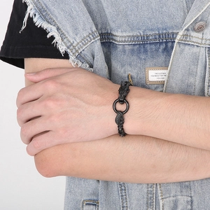 Bracelet pour homme en métal noir au design rétro avec double tête de dragon sur le poignet