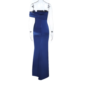 Detail of navy blue satin evening dress featuring a backless design and slim fishtail hem