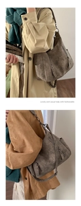 Detail of vintage brown leather tote bag with long tassels and stylish casual look