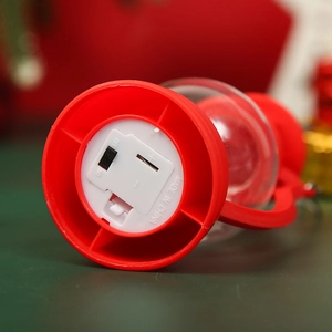 Macro view of the LED lantern base featuring battery compartment and power switch