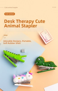 Mini cartoon animal staplers in crocodile and dinosaur shapes on pastel background