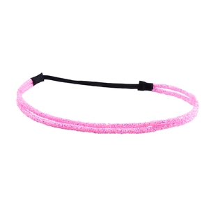 Detail of pink glitter double-strand headband with black elastic connector for women