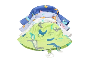 Detail view of cotton kids bucket hats with dinosaur prints and adjustable chin straps