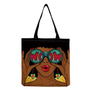 Detail of reusable tote bag featuring pop art woman illustration with WOW telescope design