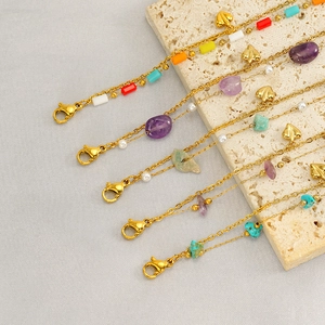 Bohemian multilayer beaded bracelet with natural stones and gold heart pendant charms