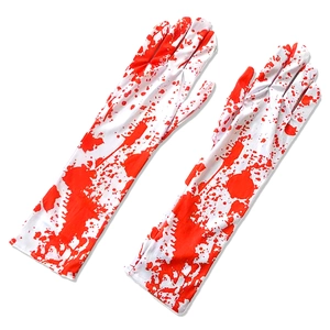 Close-up of white Halloween long gloves with realistic red blood splatter prints