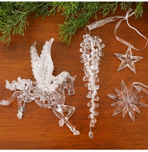Set of 4 transparent acrylic Christmas ornaments including winged horse and snowflakes