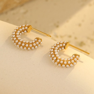 Elegant 18K gold-plated C-shaped stud earrings featuring micro-pave white pearl inlay
