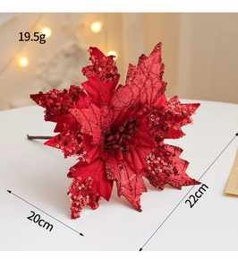 Close-up of a 22cm red artificial Christmas flower with sequins and weight details