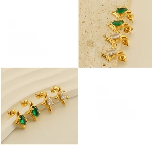 Detailed macro view of 18k gold plated stainless steel star earrings with cubic zirconia