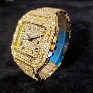 Detail of iced out gold square watch with crystal pavé and Roman numerals