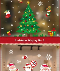 Detailed view of Christmas window clings featuring Santa Claus and snowflake stickers