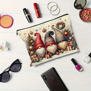 Cute Christmas gnome canvas makeup bag with festive prints and durable zipper closure