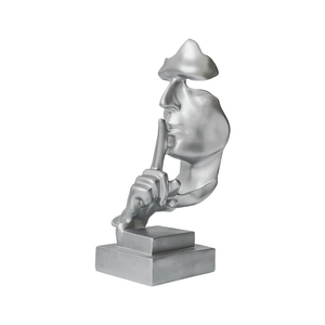 Modern silver Silence is Gold abstract face sculpture for home or office desk decor