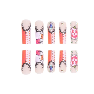Halloween pumpkin graffiti press-on nails with rhinestones in long coffin shape