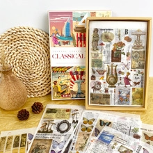Detail of vintage scrapbook kit featuring paper stickers with botanical and classical motifs