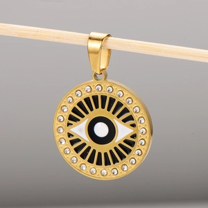 Pendentif œil grec en acier inoxydable doré 18 carats avec strass sur un support en bois