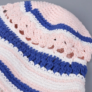Handmade crochet cotton sun hat with pink and blue stripes and hollow knit pattern