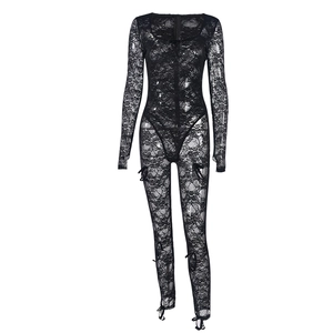 Close-up of black lace long sleeve bodysuit with delicate bow ties and sheer texture