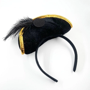 Halloween Caribbean pirate headband with black feather and gold trim on white background