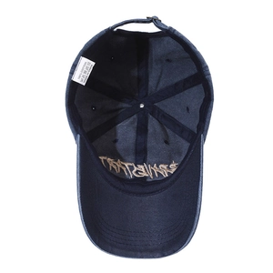 Navy blue washed cotton baseball cap with Trapstar embroidery and adjustable metal buckle