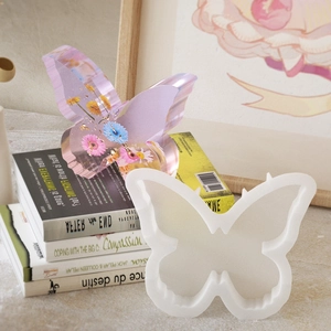 Translucent butterfly silicone mold for resin with dried flowers and gold leaf specimen