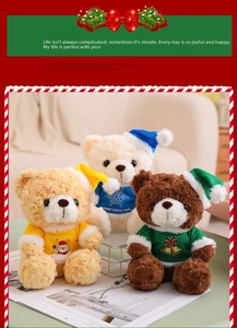 Detailed view of three-color Christmas teddy bears in festive sweaters and matching hats
