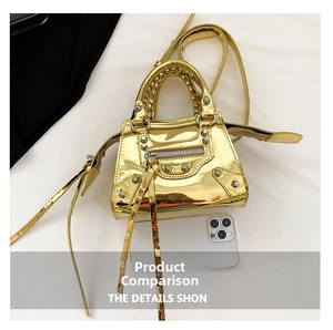 Mini metallic gold studded crossbody bag shown next to a smartphone for size comparison