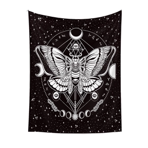 Detail of bohemian black moth tapestry with moon phases and zodiac constellation symbols