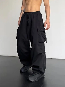 Pantalon cargo noir à séchage rapide pour homme avec taille à cordon et coupe large