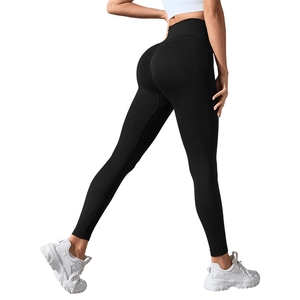High-waisted seamless black yoga pants with ribbed texture and butt-lifting design