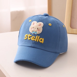 Detailed blue kids baseball cap featuring plush bunny embroidery and stella lettering
