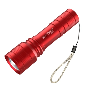 Mini LED flashlight in red aluminum with portable wrist strap on white background