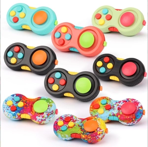 Detailed view of colorful fidget game controller pads in various matte colors and patterns