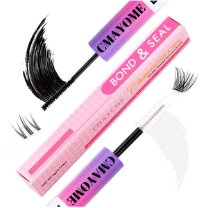 Close-up of 2-in-1 Bond and Seal eyelash glue with pink packaging and dual-ended brush