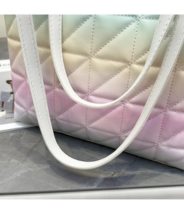 Close-up of quilted PU leather texture and pink-to-green gradient color on the tote bag