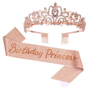 Detail of rose gold Birthday Princess tiara with rhinestones and glittery pink sash