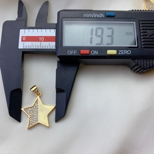 Detail showing measurement of 18K gold plated star pendant with sparkling cubic zirconia