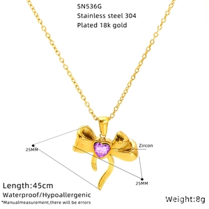 Detail view of bow pendant necklace with purple heart zircon and size specifications