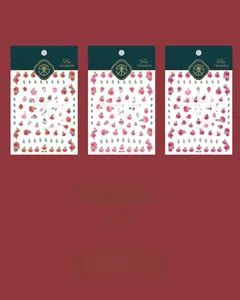 Detailed view of KX series red rose floral nail stickers with matte finish and adhesive backing