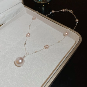 Detail of pink pearl pendant necklace in a premium jewelry gift box with S925 silver chain