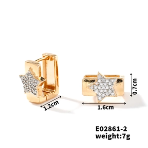 Detailed view of gold square huggie earrings with star charms and 1.6cm size specs