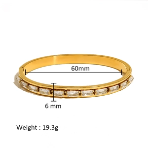 Detailed view of 6mm gold-plated titanium bracelet with rectangular crystal inlay details