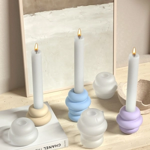 Modern wavy layered resin candle holder in soft pastel colors for minimalist home decor
