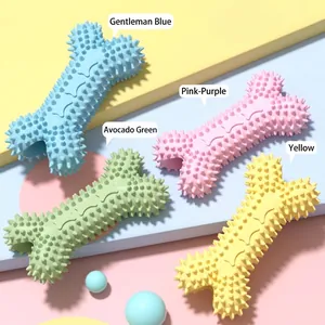 Gioco per cani a forma di osso con rilievi massaggianti in quattro colori pastello