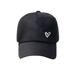 Classic black cotton baseball cap with white heart print for outdoor sun protection