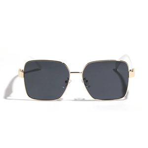 Oversized gold metal square frame sunglasses with dark gray lenses in minimalist style