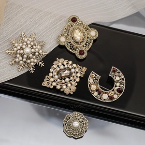 Vintage Baroque brooches set with pearls and crystals for suits and coats