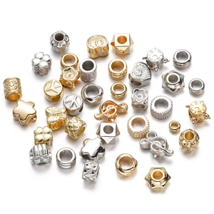 Mix of gold and silver CCB plastic spacer beads in clover heart and star shapes for DIY